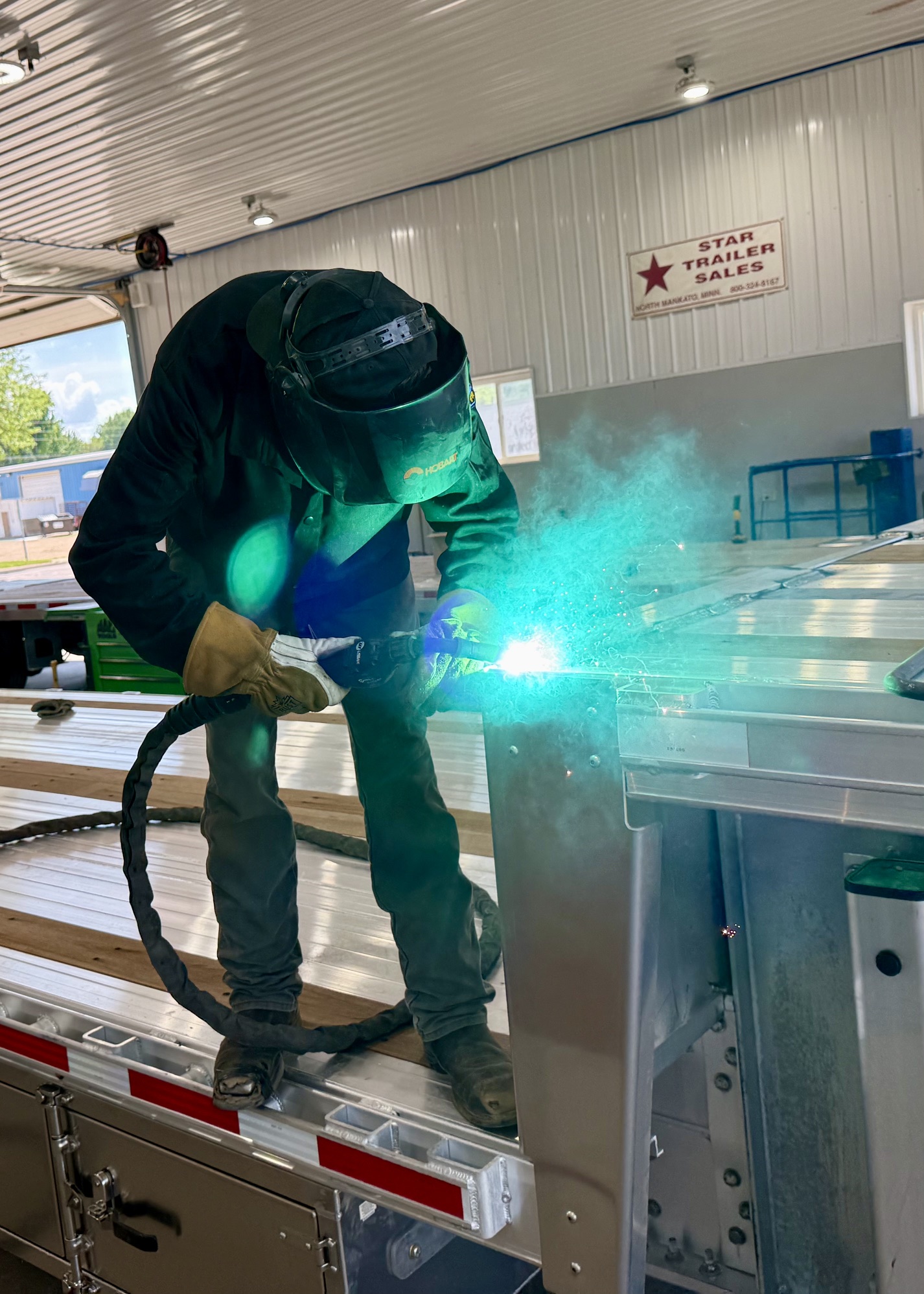 Star Trailer Sales technician welding in the shop